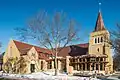 Unity Church exterior and main entrance. Stone building with bell tower