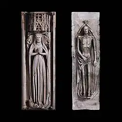 This image shows the famous 'double-decker' transi monument to Alice Chaucer, Duchess of Suffolk (d.1475) at Ewelme, Oxfordshire. On the left is the upper effigy, carved in alabaster, depicting the Duchess in life wearing flowing robes and a coronet, with her hands positioned in prayer beneath an elaborate Gothic canopy with intricate tracery. Angels support her head, and her feet rest upon heraldic beasts. On the right is the lower cadaver effigy, showing the Duchess as an emaciated corpse wrapped in a burial shroud, with the fabric parted to reveal the decomposing body beneath. This powerful memento mori contrasts sharply with the dignified upper representation, reminding viewers of mortality and the transient nature of earthly status. This is the finest surviving example of an English transi tomb and the only medieval 'double-decker' monument where both effigies are carved from alabaster, demonstrating the exceptional quality and expense of this commission.