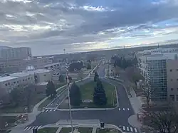 A photo taken from the seventh floor of the Fitzsimons building in 2021, facing south. The flag pole is seen in the foreground.