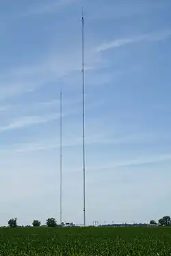 Two tall guyed towers