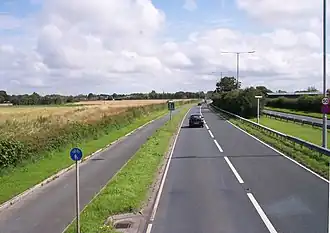 Warning of lane reduction on the A565 at Holmes (geograph 3076846).jpg