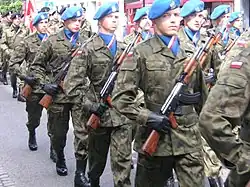 Soldiers of the Polish Army 7th Coastal Defense Brigade, wearing blue cravats striped with the flag of Poland