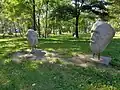 Sculptures of the heads of Wojciech Kossak and Julian Fałat by Tomasz Górnicki.