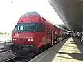 An ÖBB double deck cab car at Wien Praterstern