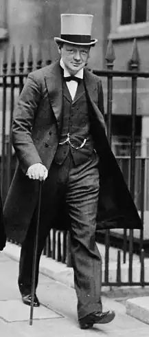 Winston Churchill in a frock coat with grey top hat, 1912.