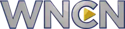 A silver lettering "WNCN" in a sans serif with blue edging. Lodged in the middle of the C is a triangle pointing forward.
