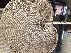 Vietnamese woven palm leaf fan