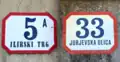 Historic Kaptol house number plate in Onyx typeface (left, repainted) and a modern one in Ilica (right)