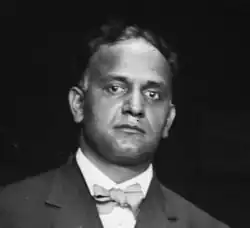 portrait of Sumner Alexander Furniss in suit with bow tie.